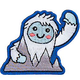 This happy yeti waves a warm welcome as they hold onto the Himalayan Mountains.