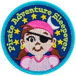 A young girl with an eyepatch and a bandana on. The words Pirate Adventure Sleepover are in an arch above her head.