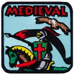A jouster on horseback carrying a black and red flag. The word Medieval is above them.