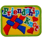 The words Friendship Knot are over the top of a knot made from red and blue string on a yellow background.