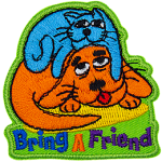 A tired cat rests on top of a tired dog with the text Bring A Friend embroidered underneath.