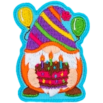 A gnome with a striped hat holds a chocolate cake.