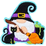 A gnome dressed as a witch holds a broom next to a black cat and a bubbling cauldron.