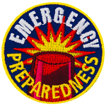 A red alarm light with the words Emergency Preparedness stitched in a circle around it.