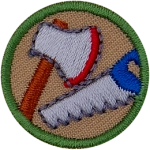 This round one-inch patch depicts the images of an axe and a saw.