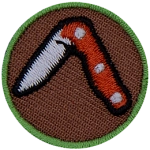 A brown handle locking knife is displayed with the blade half folded out.