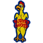A yellow rubber chicken with a distressed face. The words Rubber Chicken are across its stomach.