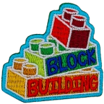 Three toy building blocks are stacked on top of each other.