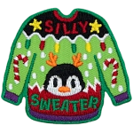 A brightly coloured sweater with the words Silly Sweater on it.