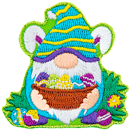 This bunny-ear-wearing gnome holds a basket full of painted eggs to show that he is ready for Easter.