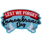 The words Lest We Forget Remembrance Day are held up by two white doves.