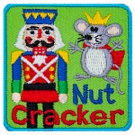 A nutcracker and the rat king above the words Nut Cracker. 