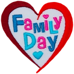 This two-toned heart-shaped patch has the words 'Family Day' embroidered in blues and pinks.