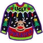 An ugly Christmas sweater with a reindeer face on it and the words Ugly Sweater stitched into the top and bottom.