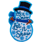 A snowperson wearing a top hat and a scarf. The words Let It Snow Let It Snow are stitched across the body.
