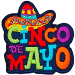 A sombrero sits on top of colourful letters that spell out Cinco de Mayo