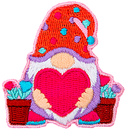 A gnome holds a big heart, and potted heart flowers stand to either side of him.