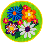 Four large flowers (a blue, an orange, a purple and a white one) are on a green background with tiny pink flowers in between them.