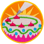 The top of a cake is decorated by a floating icing bag. 