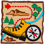 A map with a dotted path, a hiking boot and a compass.