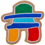 This inukshuk statue-shaped laser-cut crest displays a variety of colours.