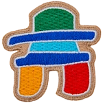 This inukshuk statue-shaped laser-cut crest displays a variety of colours.