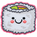 A piece of rice-coated sushi has a center of green, pink, and yellow. The sushi has a kawaii face.