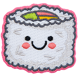 A piece of rice-coated sushi has a center of green, pink, and yellow. The sushi has a kawaii face.