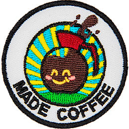 A coffee pot with a smiling face above the words Made Coffee.