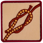 This square badge displays step three on how to make a square knot. Now just tighten the knot, and you're done.