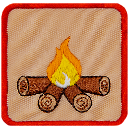 This square badge is part one of a three-part collection that displays a growing campfire. A small yellow flame burns on top of logs in this orange-bordered patch.