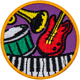 A guitar, piano, drum and trumpet on a circle patch.