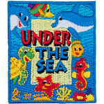 The words Under The Sea are surrounded by smiling sea creatures such as a turtle, a seahorse, two dolphins, a fish and a starfish on an ocean background.