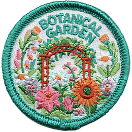 An archway trellis surrounded by plants.