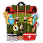 A green backpack full of camping gear. 