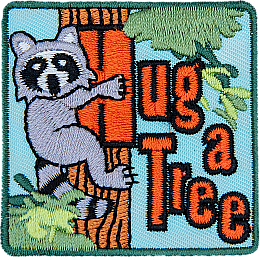 A raccoon hugs a tree with the words Hug A Tree in orange text next to it.