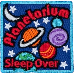 The words Planetarium Sleepover are in a galaxy full of stars and planets.