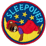 A teddy bear in red pyjamas sleeps on a crescent moon under the word Sleepover.