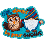 A blue gnome and a brown owl have their arms around each other. The words Owl Always Be Your Gnomie are around them.