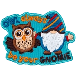 A blue gnome and a brown owl have their arms around each other. The words Owl Always Be Your Gnomie are around them.