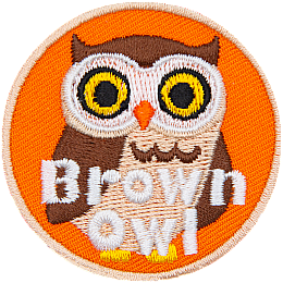 A brown owl stares at the viewer. The words Brown Owl are across the bottom.