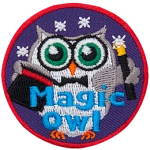 A grey owl holds a black tophat and a magician's wand. The words Magic Owl are across the bottom.