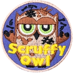 A brown owl covered in dirt with the words Scruffy Owl across the bottom.