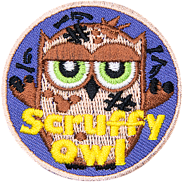 A brown owl covered in dirt with the words Scruffy Owl across the bottom.
