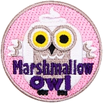 A white owl shaped like a marshmallow stares at the viewer. The words Marshmallow Owl are across the bottom.