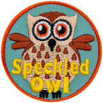 A cream-coloured owl speckled with brown feathers. The words Speckled Owl are at the bottom.