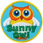 A yellow owl with white wings and a white belly with the words Sunny Owl at the bottom.