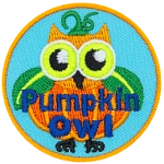 A round owl shaped like a pumpkin with leaves for wings. The words Pumpkin Owl are across the bottom.