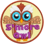 The S'more owl represents the treat it is named after. The owl is composed of a graham cracker colour, a marshmallow belly, and a chocolate swirl on its head.
