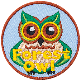 A green and brown owl stares straight ahead. The owl's ears are leaves. The words Forest Owl are across the bottom.